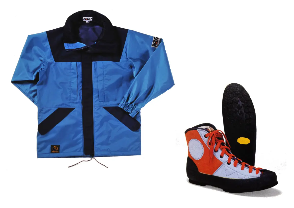 Blue Alpine jacket "Stream Jacket"; Red and light blue climbing shoes