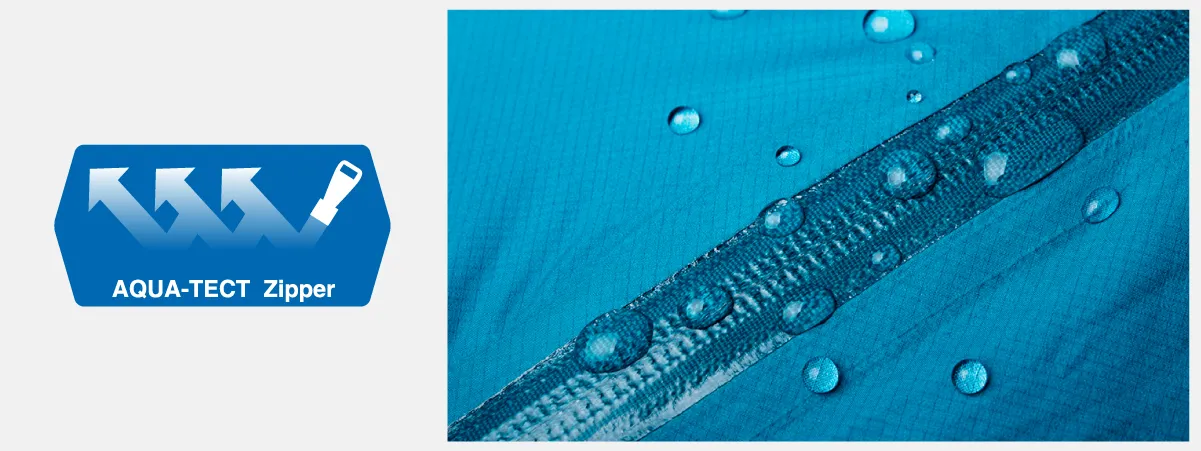 WINDSTOPPER fabrics by GORE-TEX LABS logo and fabric cross-section diagram, showing water vapor passing through lining, down, GORE-TEX membrane, and outer layer, while rain and wind are blocked by outer layer and membrane