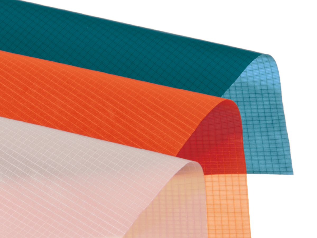 Down-proof fabric in blue, red, and white with special treatment to prevent feather leakage