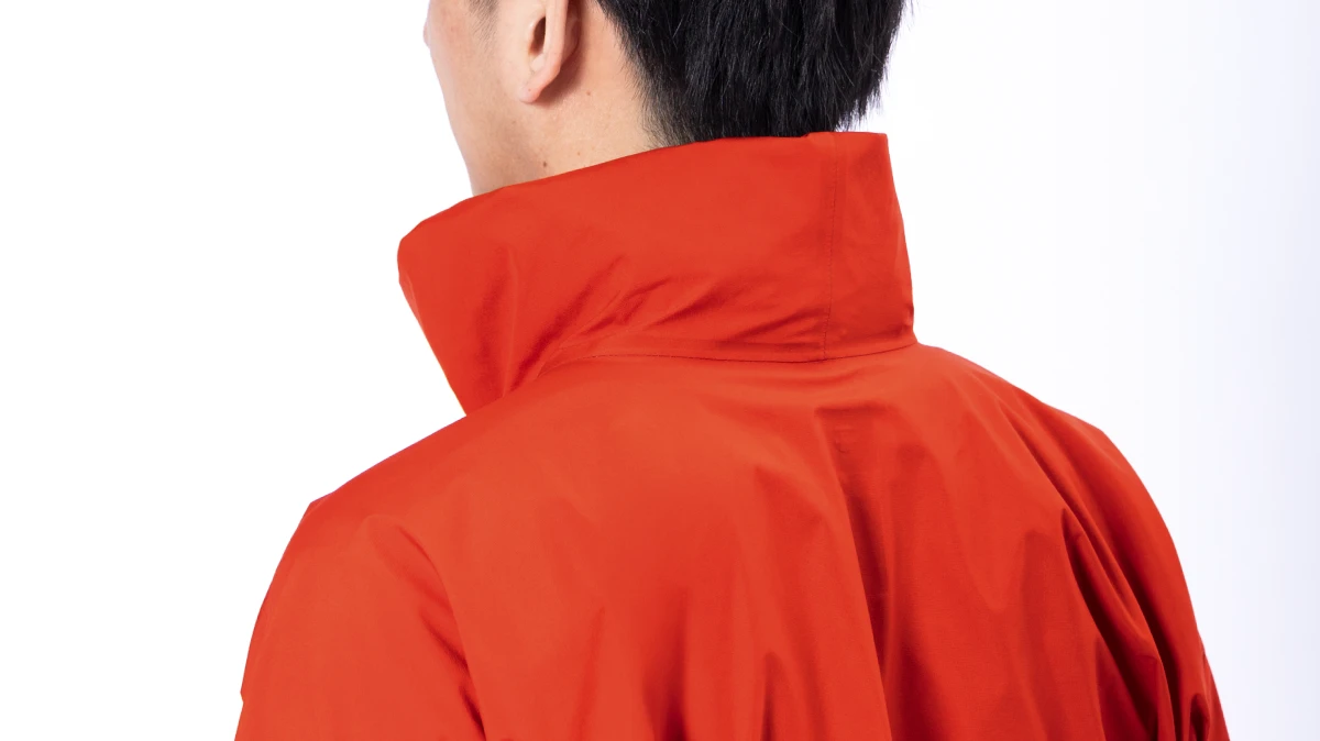 Photo of hood secured with hook-and-loop on the inside of the collar