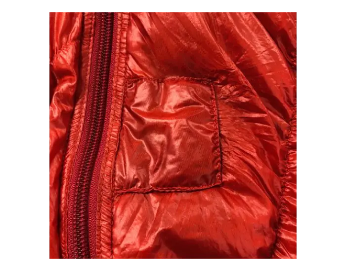 Sleeping bag after repair: Patched with matching fabric.