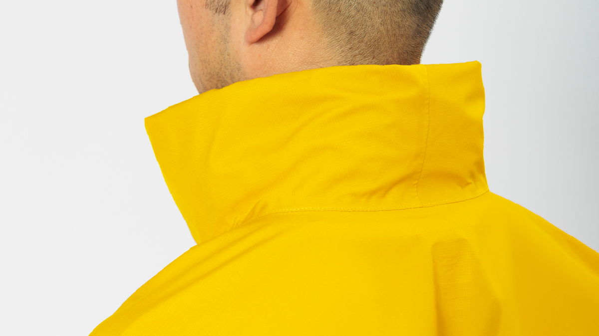 Photo of hood secured with hook-and-loop on the inside of the collar