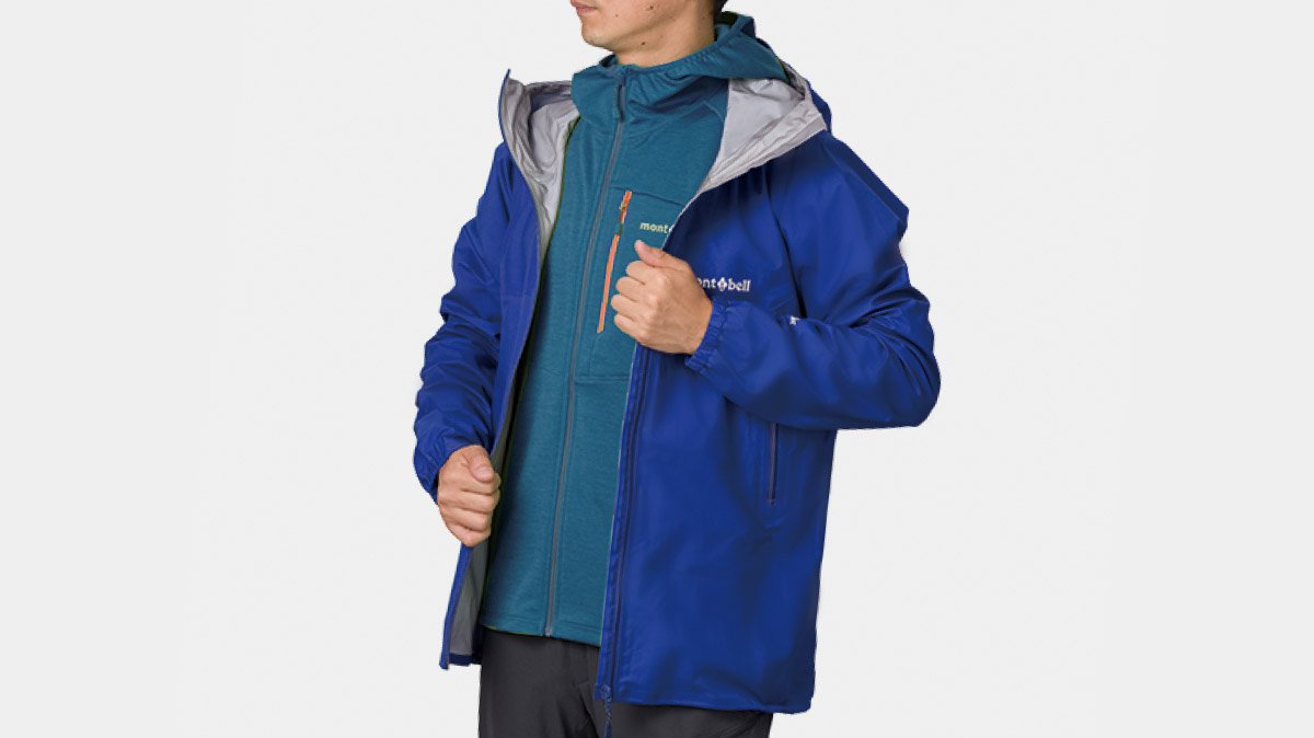 Image of layering the CLIMAGRID Hooded Jacket  underneath Rainwear