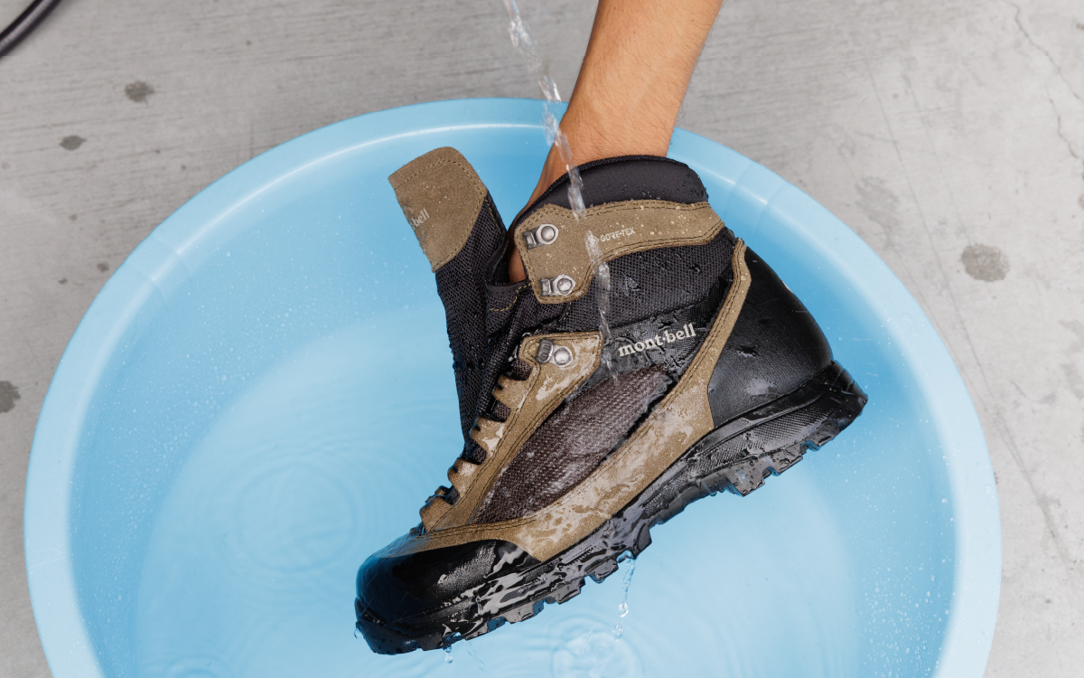 Wetting the entire hiking boot in a wash basin