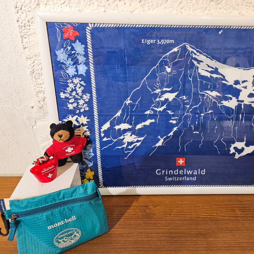 Grindelwald store original bandanas, pouches, key chains, and trekking bells
